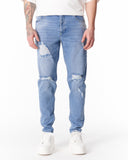 Ripped Slim Fit Jeans in Washed Blue