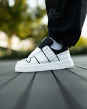 Bulky White Sneakers With Black Line and Tongue