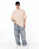 ‘777’ Men’s Oversized Beige Designer T-shirt with 3D Print Detail in a full-body studio product image