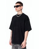 Men's Extra Oversized Basic Black T-shirt styled with black sunglasses and pearl necklace