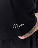 Men's Extra Oversized Basic Black T-shirt worn with faded grey denim jeans