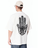 Men's Oversized Martin Valen Screen Printed White Heavy T-Shirt paired with baggy denim cargo pants