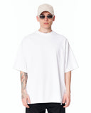Because Text Print Oversized White T-Shirt styled with washed denim jeans