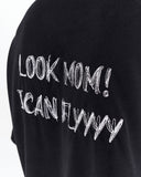 Look Mom Text Print Oversized Black T-Shirt styled with washed grey denim