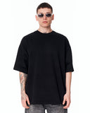 Loved Me Heart Graphic Oversized Black T-Shirt styled with washed grey denim