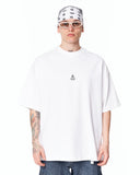Namaste Streetwear Oversized White T-Shirt styled with blue denim jeans