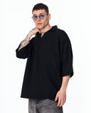 Men’s Oversized Linen Fabric Shirt with V-Neck in Black styled in a minimal studio setting