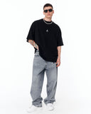 Namaste Streetwear Oversized Black T-Shirt with monochrome text graphic
