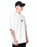 Underground Hip Hop Oversized White T-Shirt styled with blue denim jeans