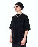Utility Pocket Oversized Black T-Shirt styled with light wash denim