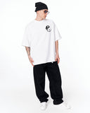 Yin Yang Brush Graphic Oversized White T-Shirt styled with bandana and denim