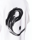 Yin Yang Brush Graphic Oversized White T-Shirt paired with dark grey jeans