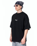 "Slogan" Men’s Oversized Printed Designer T-shirt in Black featuring an oversized fit and small chest print