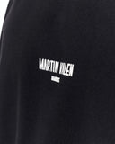 "Slogan" Men’s Oversized Printed Designer T-shirt in Black worn with a bandana and narrow sunglasses