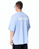 "Slogan" Men’s Oversized Printed Designer T-shirt in Blue with a soft light blue tone and relaxed silhouette
