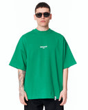 "Slogan" Men’s Oversized Printed Designer T-shirt in Green shown on a model in a clean studio front view