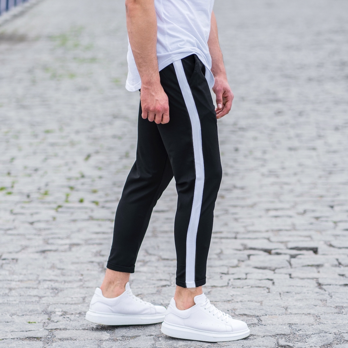 black joggers with stripe