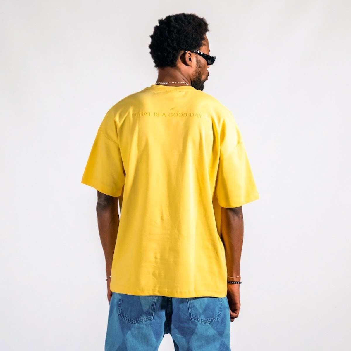 "Freiheit" Herren Bedrucktes Oversize T-Shirt aus dickem Stoff in Gelb | Martin Valen