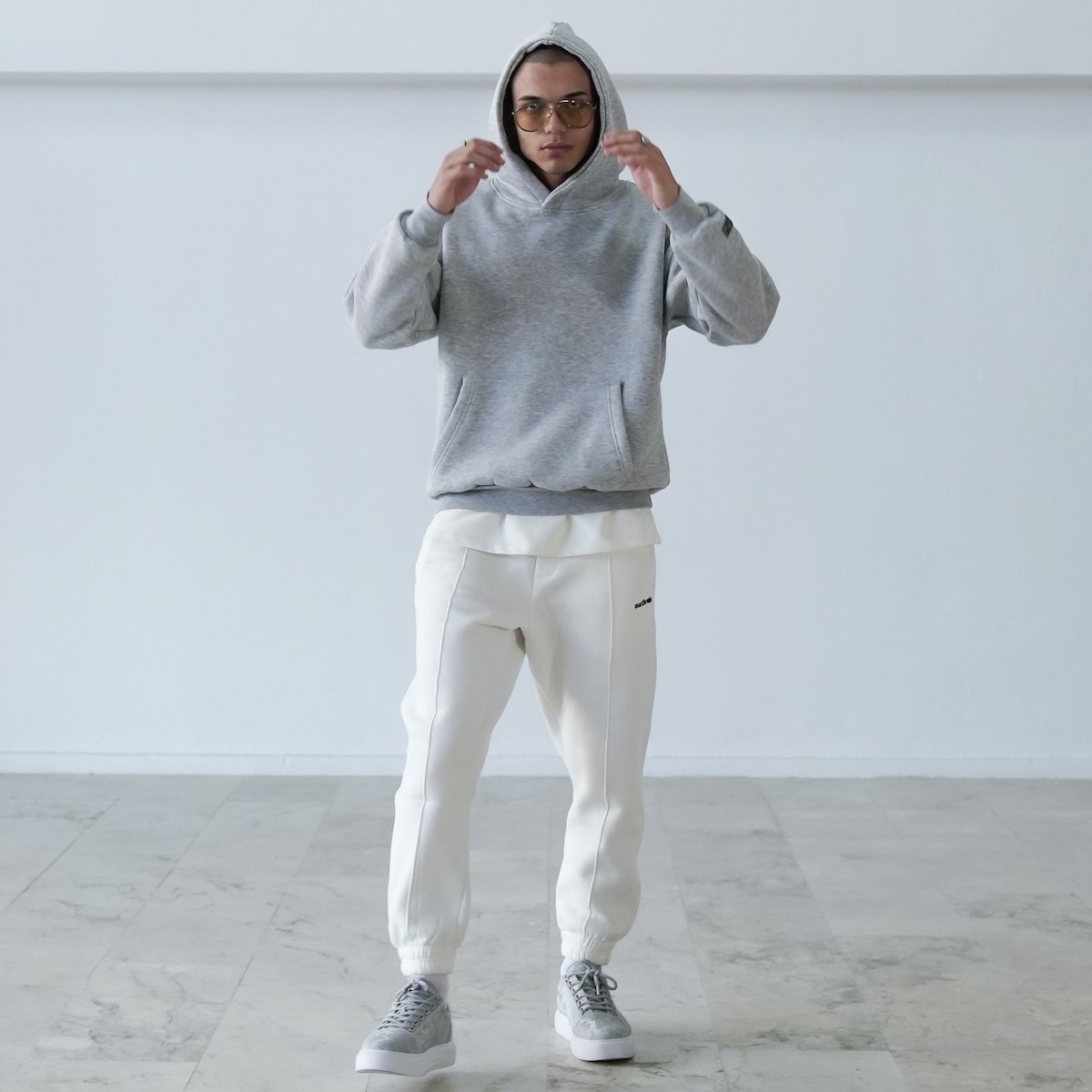 Hoodie Oversize Grigio Mélange da Uomo con Dettaglio in Rilievo 3D | Martin Valen