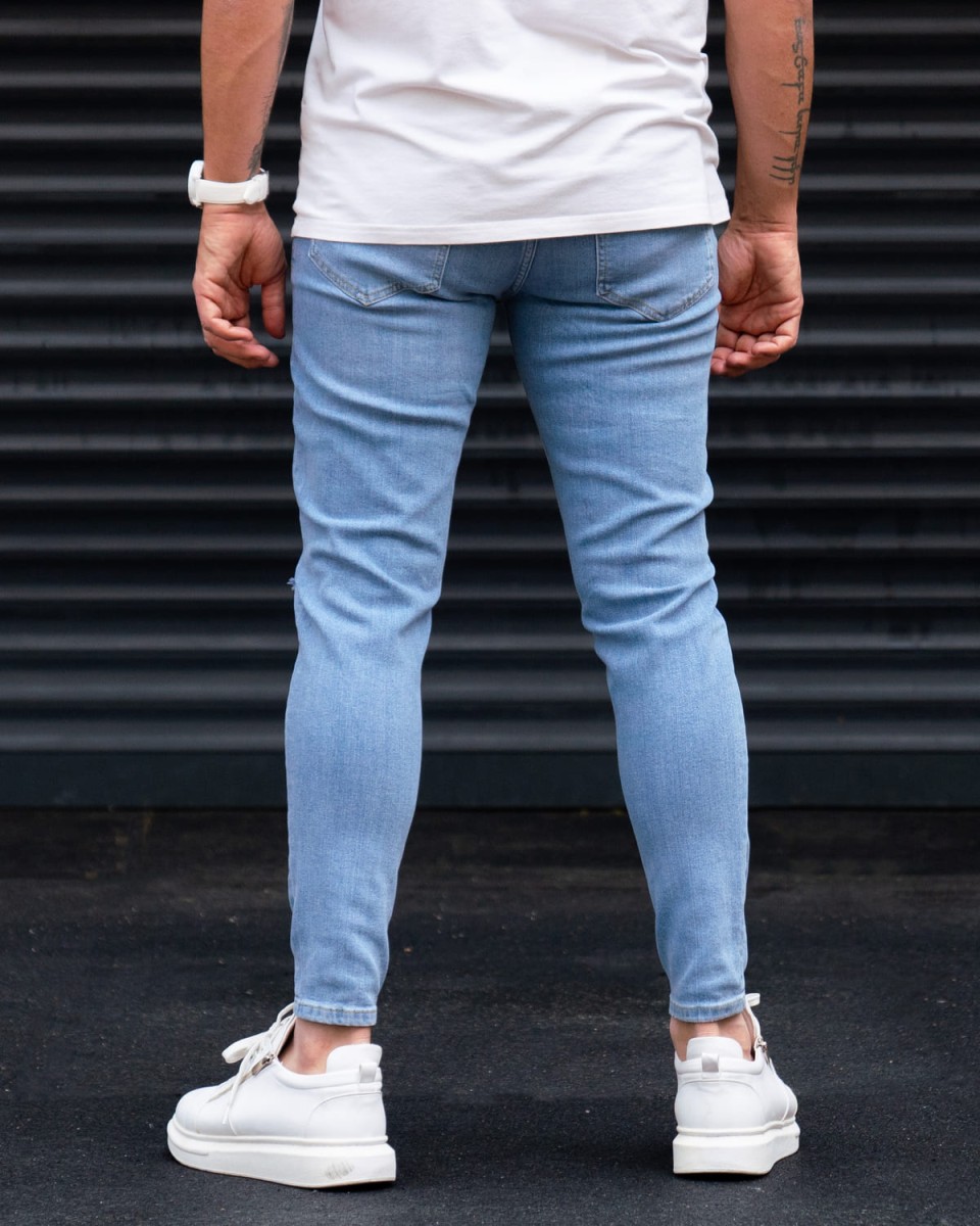 Ripped Slim Fit Jeans in Washed Blue | Martin Valen