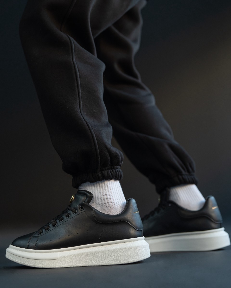 Sneakers à semelles épaisses débordantes noir N°21 pour hommes