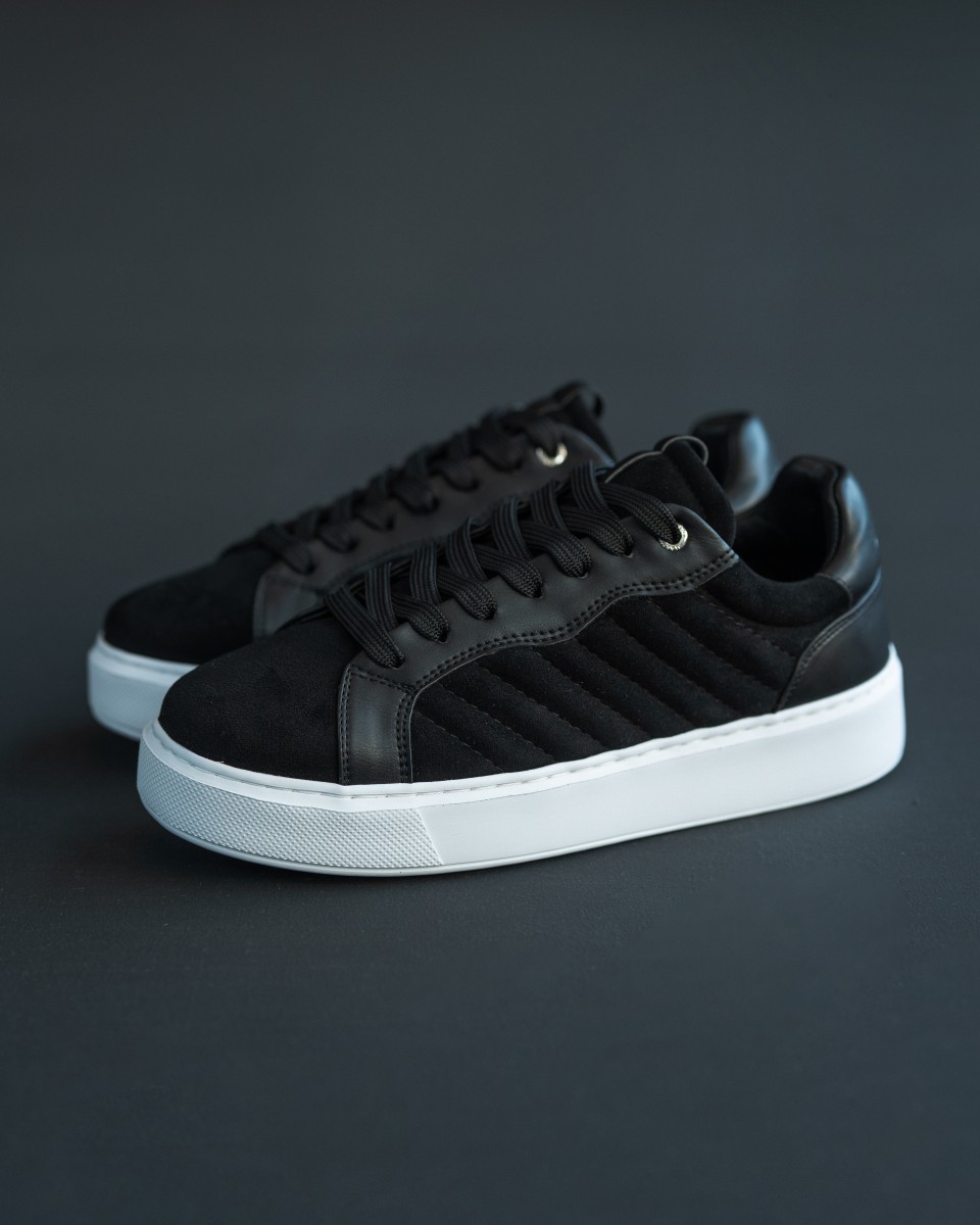 https://martinvalen.com/24674-mv_large_default/diagonair-exclusive-striped-suede-sneakers-in-black.jpg