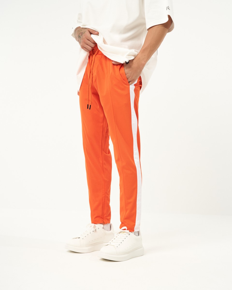 Pantalon orange à Rayures Blanches