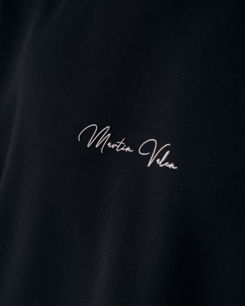 Oversized Zwarte Hoodie voor Heren Zonder Koord met Handtekening Detail | Martin Valen