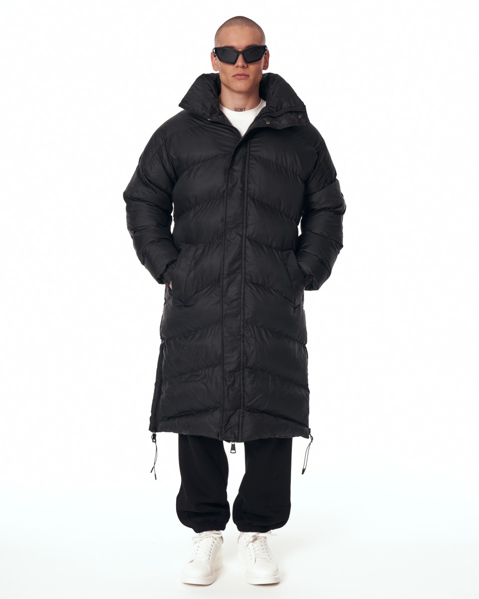 Длинное черное объемное пуховое пальто с высоким воротником | Martin Valen