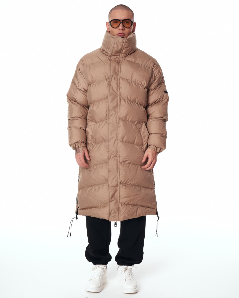 Оверсайз пуховое пальто бежевого цвета с высоким воротником | Martin Valen