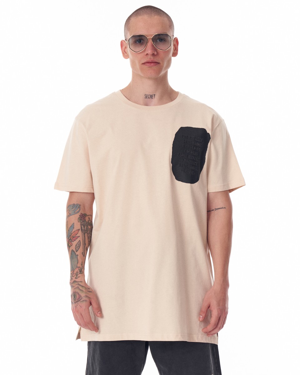 T-shirt beige oversize stampata da uomo con testo