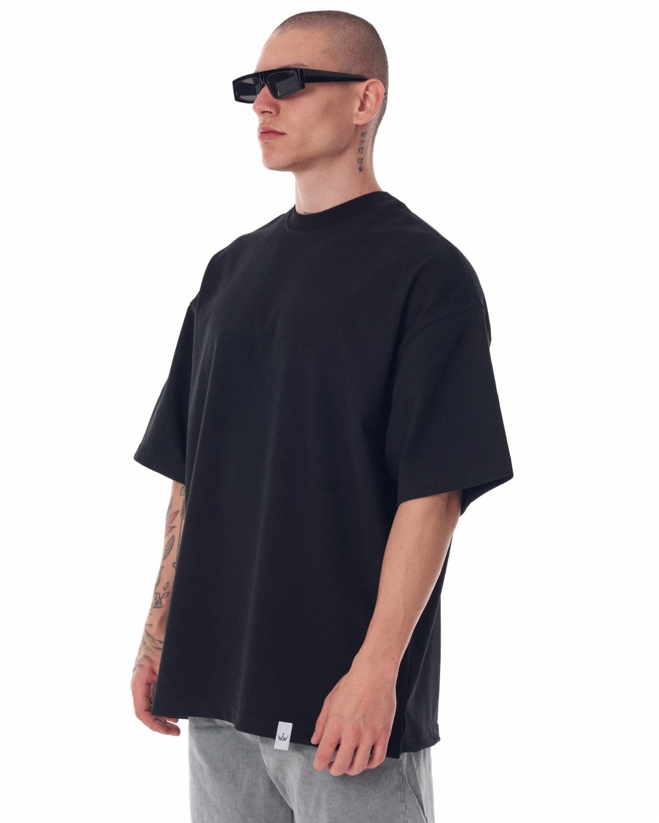 Мужская черная тяжелая футболка оверсайз с трафаретным принтом | Martin Valen