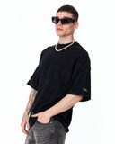 Men's Extra Oversized Basic Black T-shirt shown on a model against a white background
