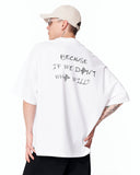Because Text Print Oversized White T-Shirt paired with blue denim jeans