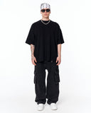 Follow The Stream Oversized Black T-Shirt with urban streetwear typography