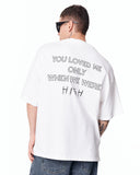 Loved Me Text Print Oversized White T-Shirt styled with casual sneakers