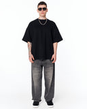 No Heart Graphic Oversized Black T-Shirt with red artwork and casual denim