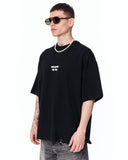 Underground Hip Hop Oversized Black T-Shirt styled with grey washed denim