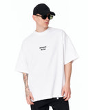 Underground Hip Hop Oversized White T-Shirt styled with denim and sneakers