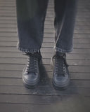 Video: Martin Valen MonoFlux High Sole Black Elastic Scuba Fabric Sneakers – male model adjusts his jeans and showcases the sneakers on foot