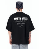 "Slogan" Men’s Oversized Printed Designer T-shirt in Black styled for modern casual streetwear looks