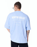 "Slogan" Men’s Oversized Printed Designer T-shirt in Blue styled with black trousers for a clean casual outfit
