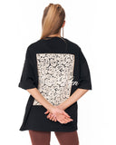 3D Embroidery Applique Lace Black T-shirt paired with white sneakers
