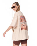 Heritage Fusion Beige Oversized T-shirt paired with white sneakers