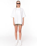 "Loved Me" Text Print White Oversized T-shirt styled with neutral shorts