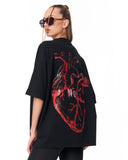 No Heart Graphic Black Oversized T-shirt styled with black leggings