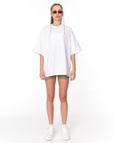 No Heart Graphic White Oversized T-shirt styled with neutral biker shorts