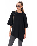 Women's Oversized Asymmetrical Black T-Shirt styled with grey leggings