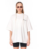Oversized Martin Valen Screen Printed White T-shirt styled with black biker shorts