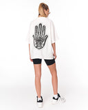 Oversized Martin Valen Screen Printed White T-shirt paired with white sneakers